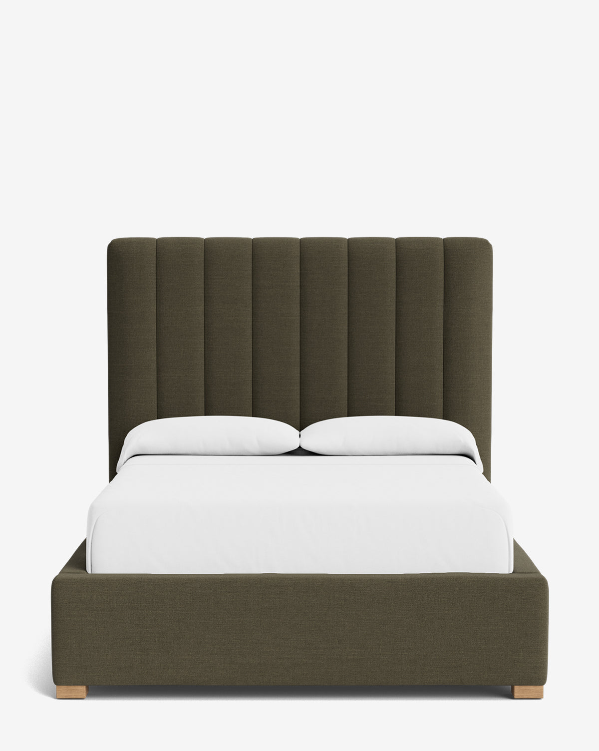 The Hoffman Bed Tall Headboard features a tall, olive green, vertically channeled upholstered headboard and frame with customizable fabrics, set on short wooden feet and styled with white bedding and pillows against a white background, by Vendixs