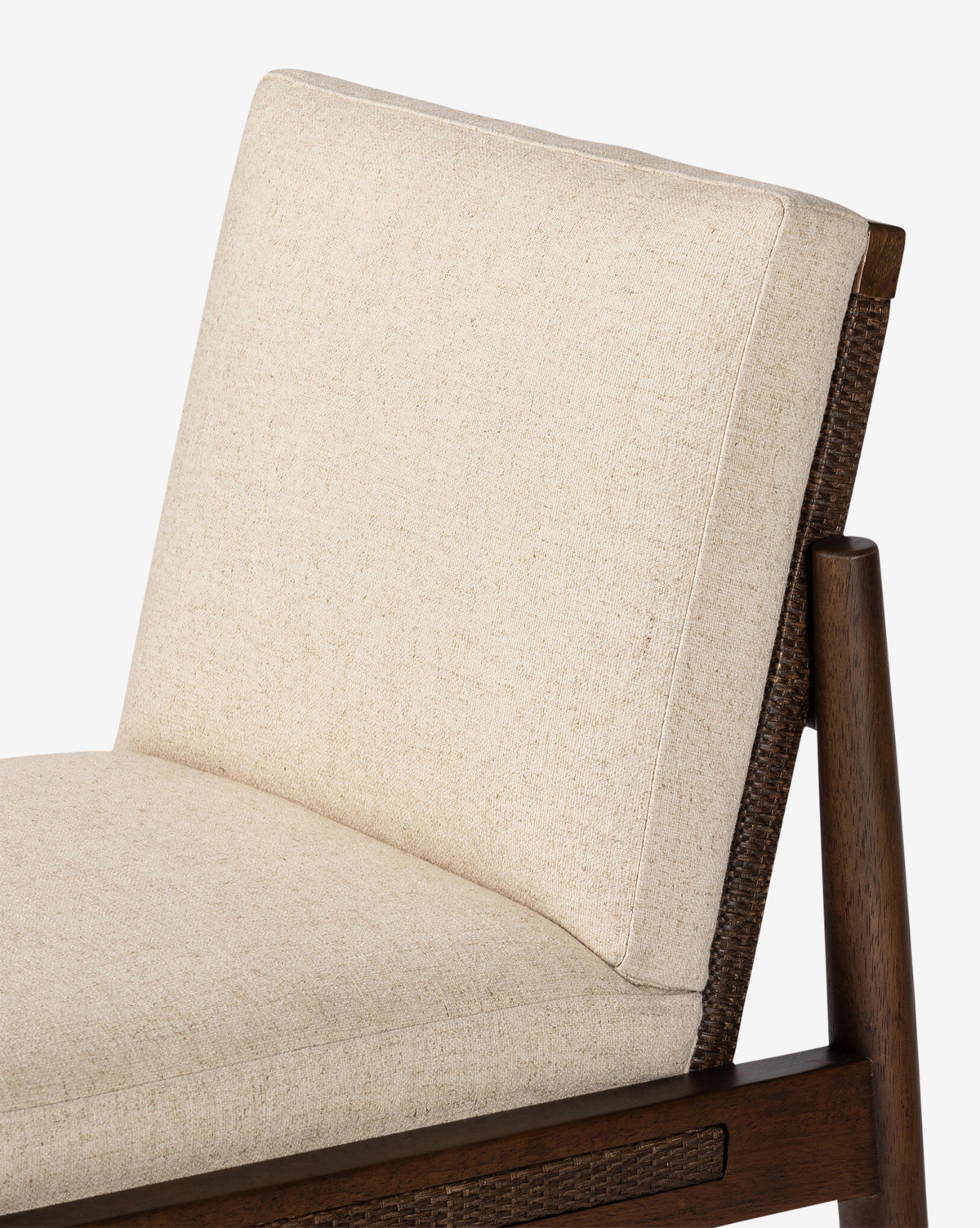Close-up of the Hurley Dining Chair, showcasing its cushioned seat and backrest in light beige performance upholstery on a medium brown wooden frame with a simple, contemporary design, by Vendixs