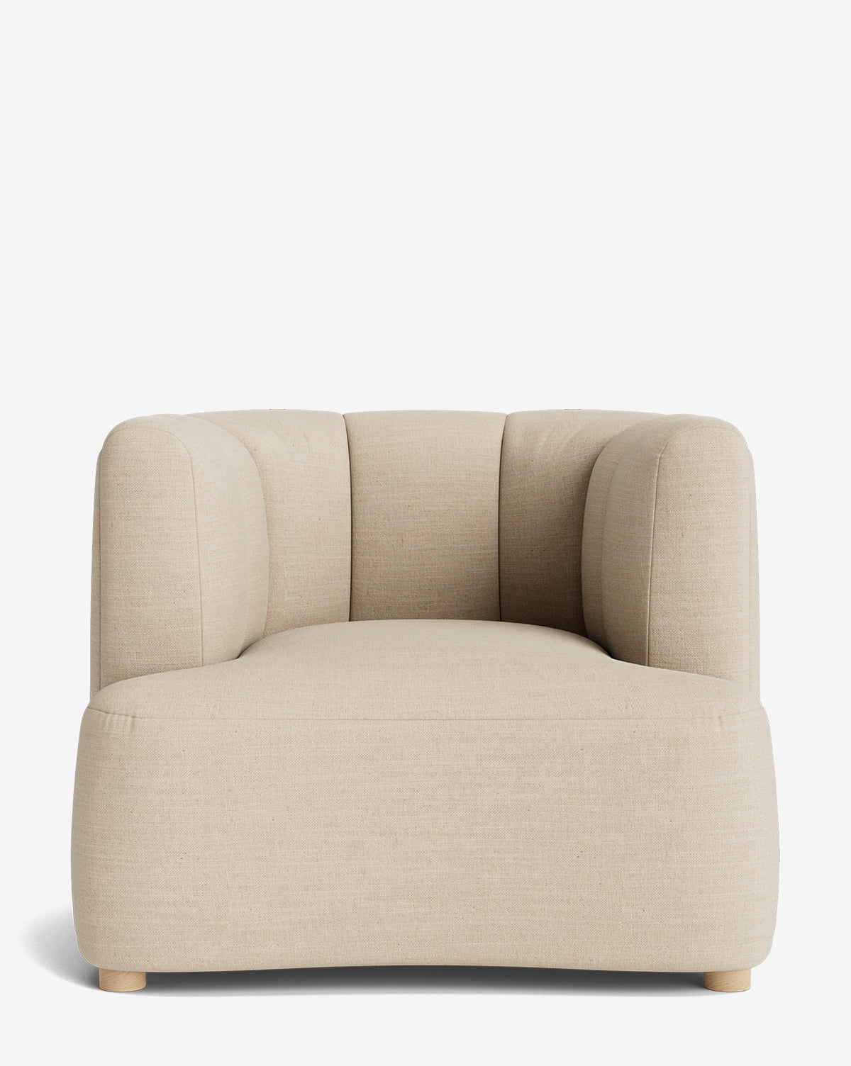 The Ines Lounge Chair is a modern, light beige upholstered armchair with rounded edges, a low backrest, plush cushioned seat, and light wooden feet, shown isolated on a white background by McGee & Co.