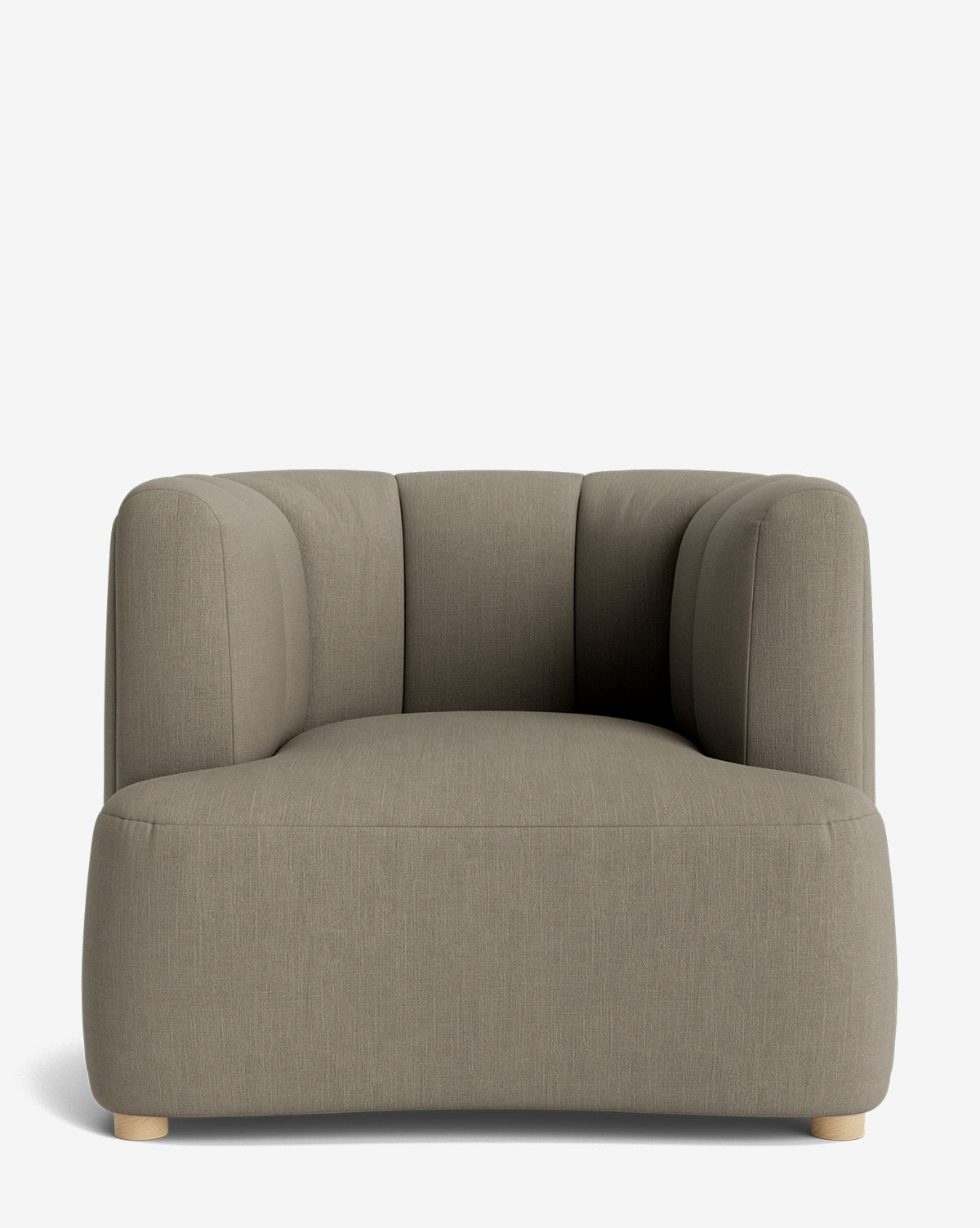 The Ines Lounge Chair is a modern taupe velvet armchair with plush cushioning, subtle vertical seams, rounded edges, and low wooden legs, presented against a plain white background for an elegant look by McGee & Co.