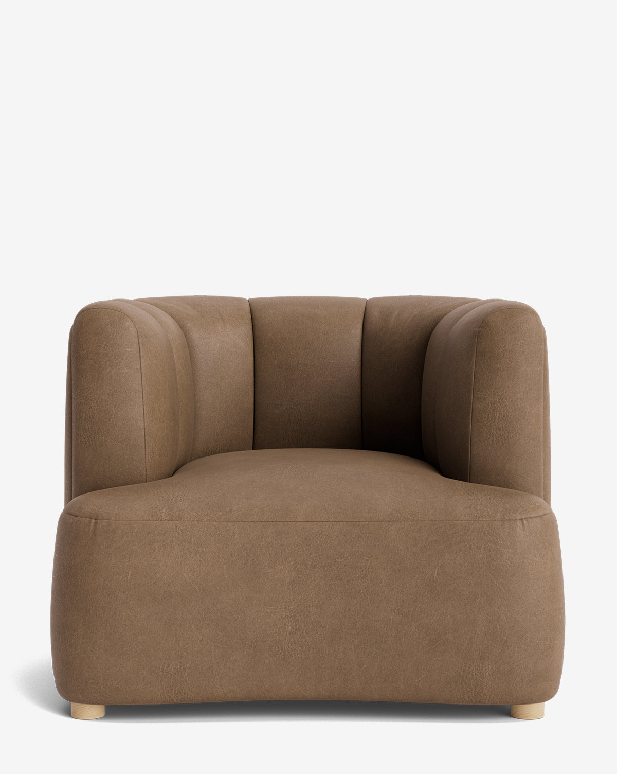 The Ines Lounge Chair is a modern, plush brown seat with rounded edges and a low backrest, upholstered in smooth velvet, shown against a plain white background by McGee & Co.