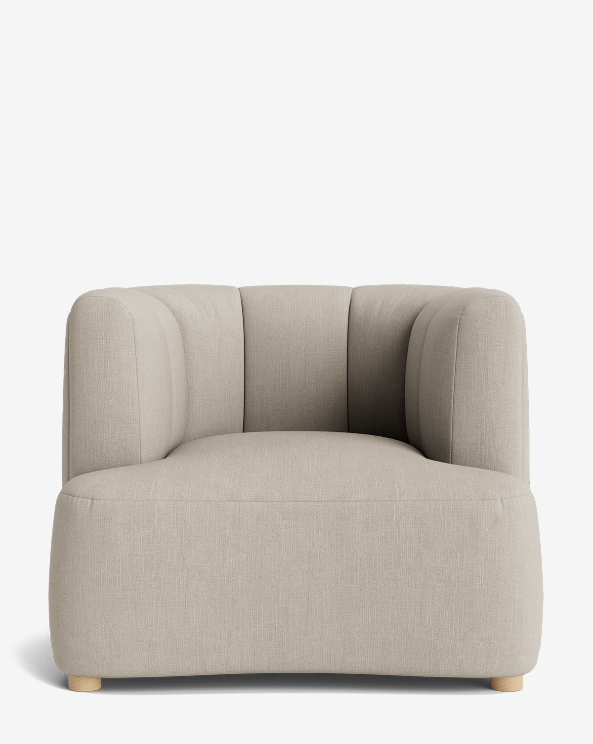 The Ines Lounge Chair features light beige velvet upholstery, rounded edges, and low wooden legs, displayed against a plain white background by McGee & Co.