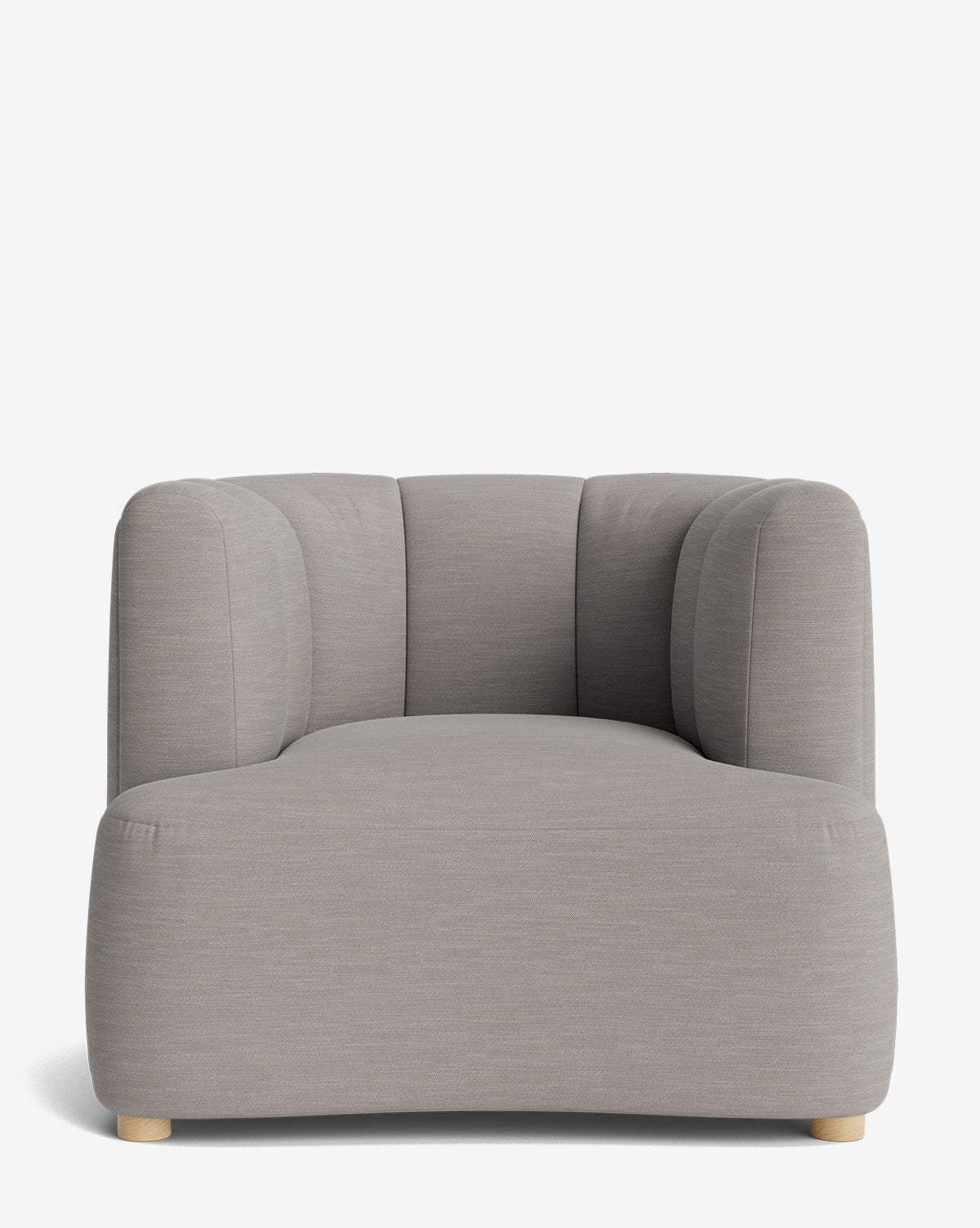 The Ines Lounge Chair is a modern, wide lounge chair with light gray upholstery, rounded edges, plush cushioning, and short light wooden legs, shown against a white background by McGee & Co.