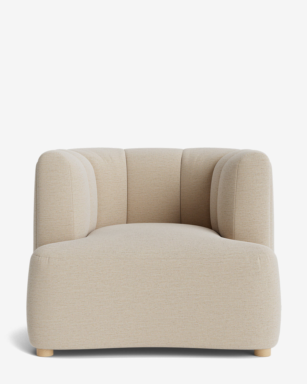 The Ines Lounge Chair is a modern beige velvet chair with a low profile, wide seat, rounded edges, and subtle vertical tufting on the backrest, shown from the front against a plain white background by McGee & Co.