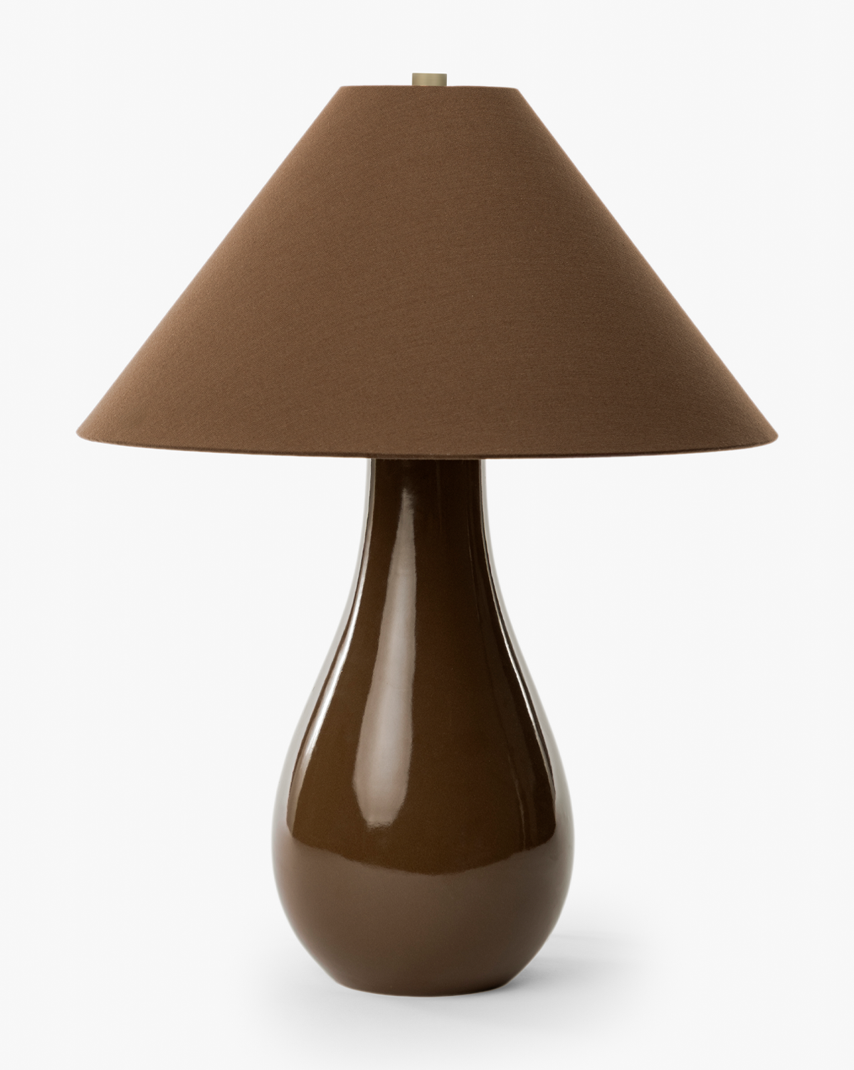The Irving Table Lamp features a glossy brown sculptural base and a wide fabric shade, shown against a plain white background, by McGee & Co.