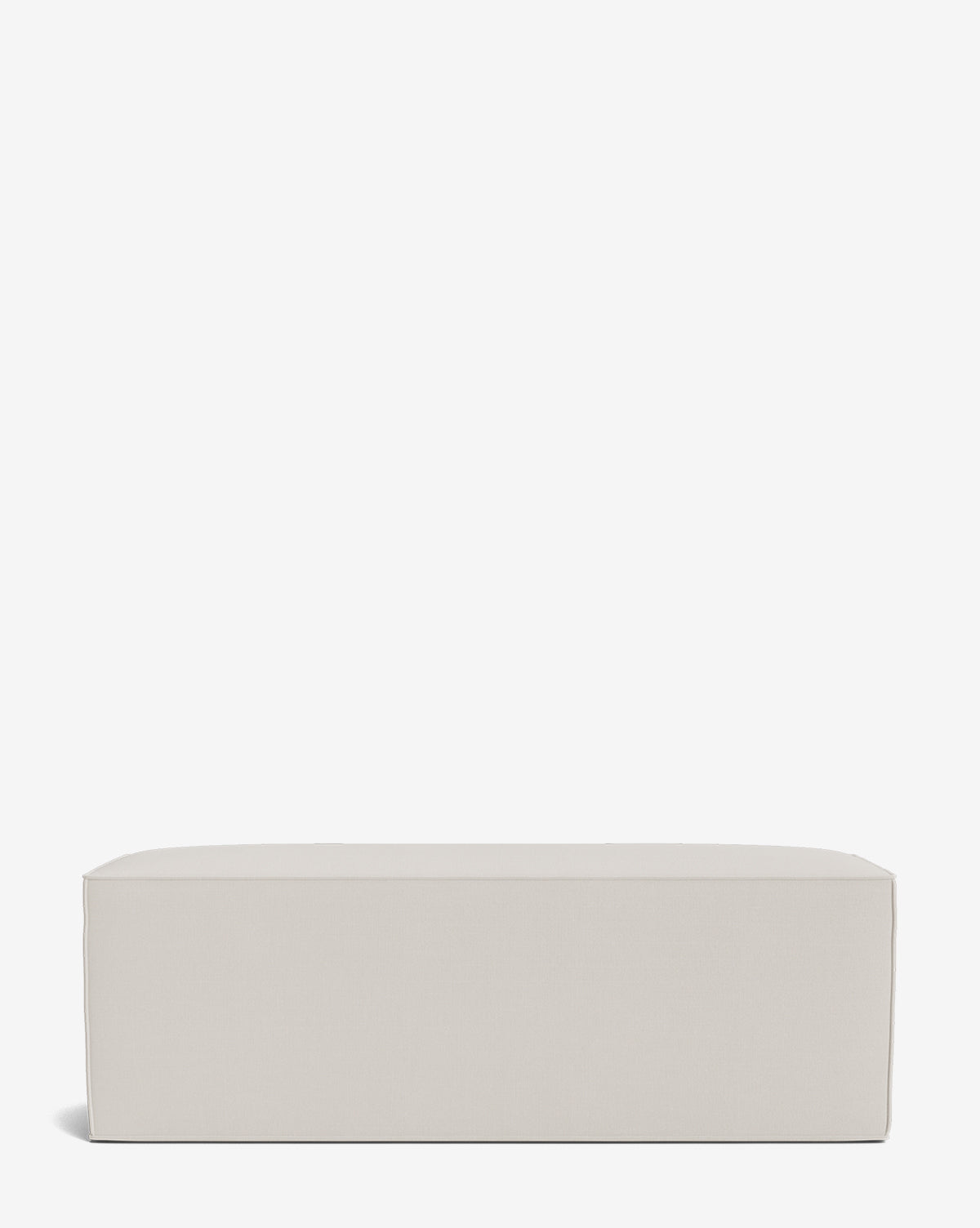 The Johannes Bench is a modern, rectangular bench with light gray cushions, smooth clean lines, and no visible legs, shown against a plain white background by McGee & Co.