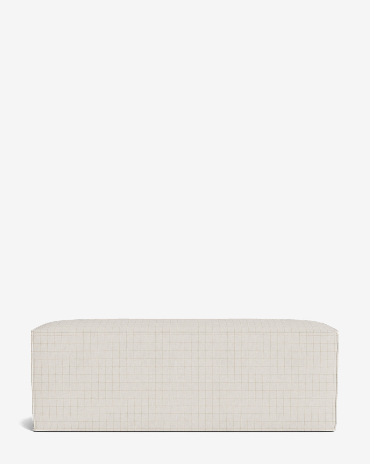 The Johannes Bench is a rectangular ottoman in light beige with a subtle grid pattern, displayed on a white background for a modern, cushioned look by McGee & Co.