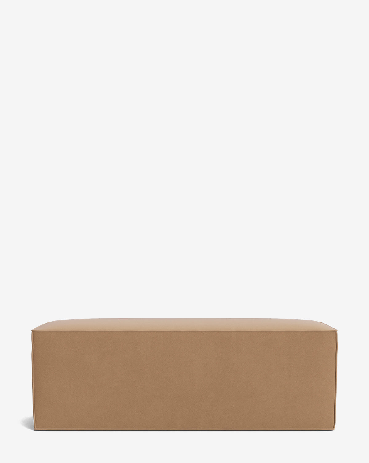 The Johannes Bench, featuring a rectangular shape, tan color, clean lines, and a soft cushioned surface, is displayed against a plain white background by McGee & Co.