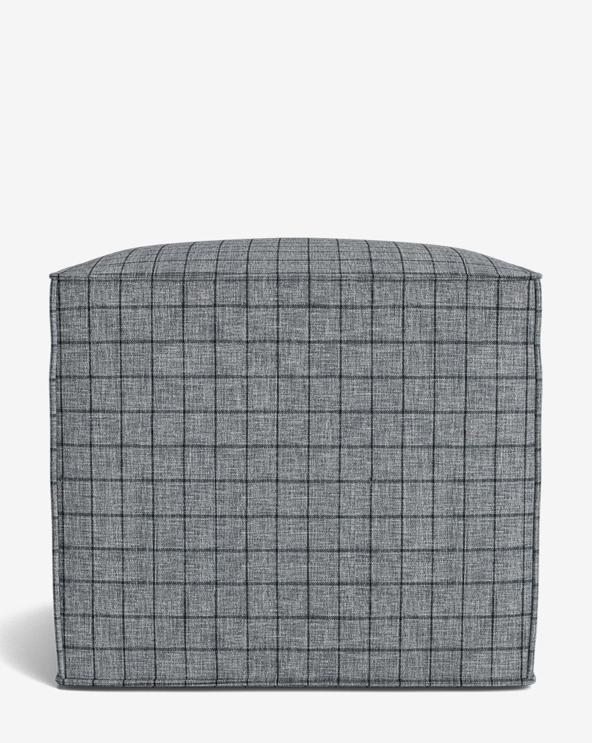 The Johannes Cube is a made-to-order square ottoman upholstered in gray fabric with a black grid pattern and a cushioned seat, shown against a plain white background, by McGee & Co.
