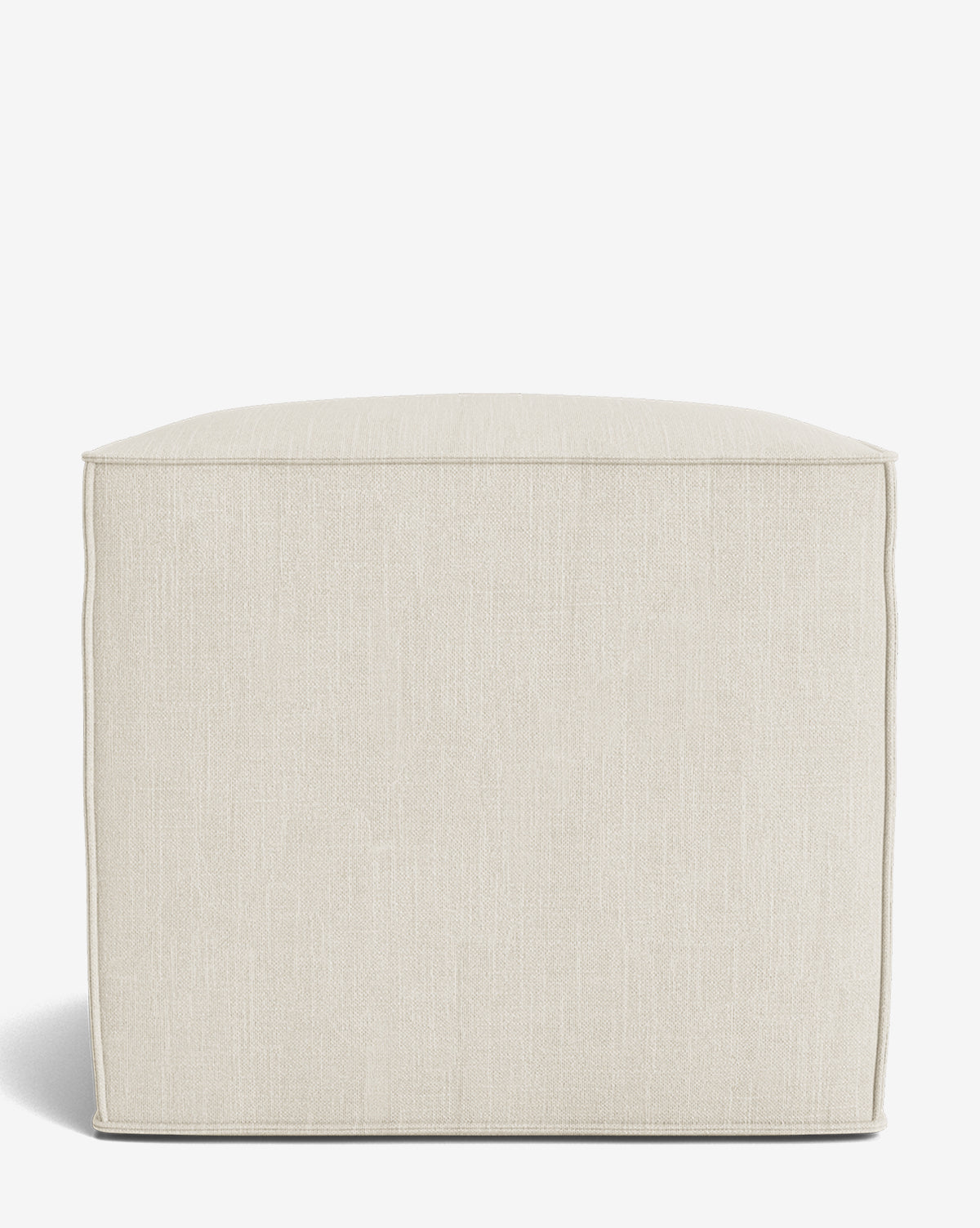 The Johannes Cube is a square, light beige ottoman with a cushioned seat and subtly textured fabric, featuring a minimalist design, by Vendixs Shown against a white background.