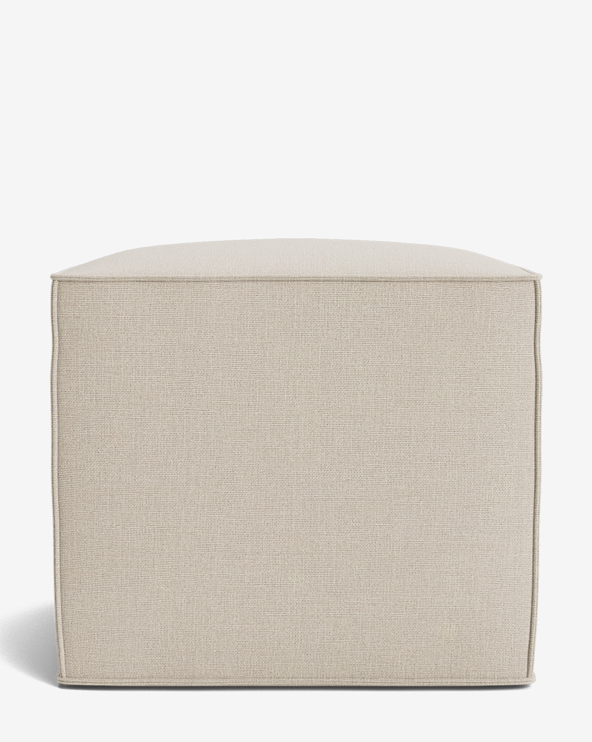 The Johannes Cube is a square beige ottoman with a cushioned seat and soft fabric upholstery, showcasing a minimalist design against a plain white background, by McGee & Co.