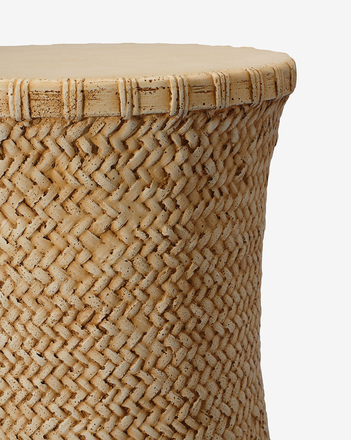 A close-up of the Made Goods Keira Stool highlights its tan and beige cylindrical basket weave texture and solid flat top, adding a rustic touch against a plain white background, Vendixs