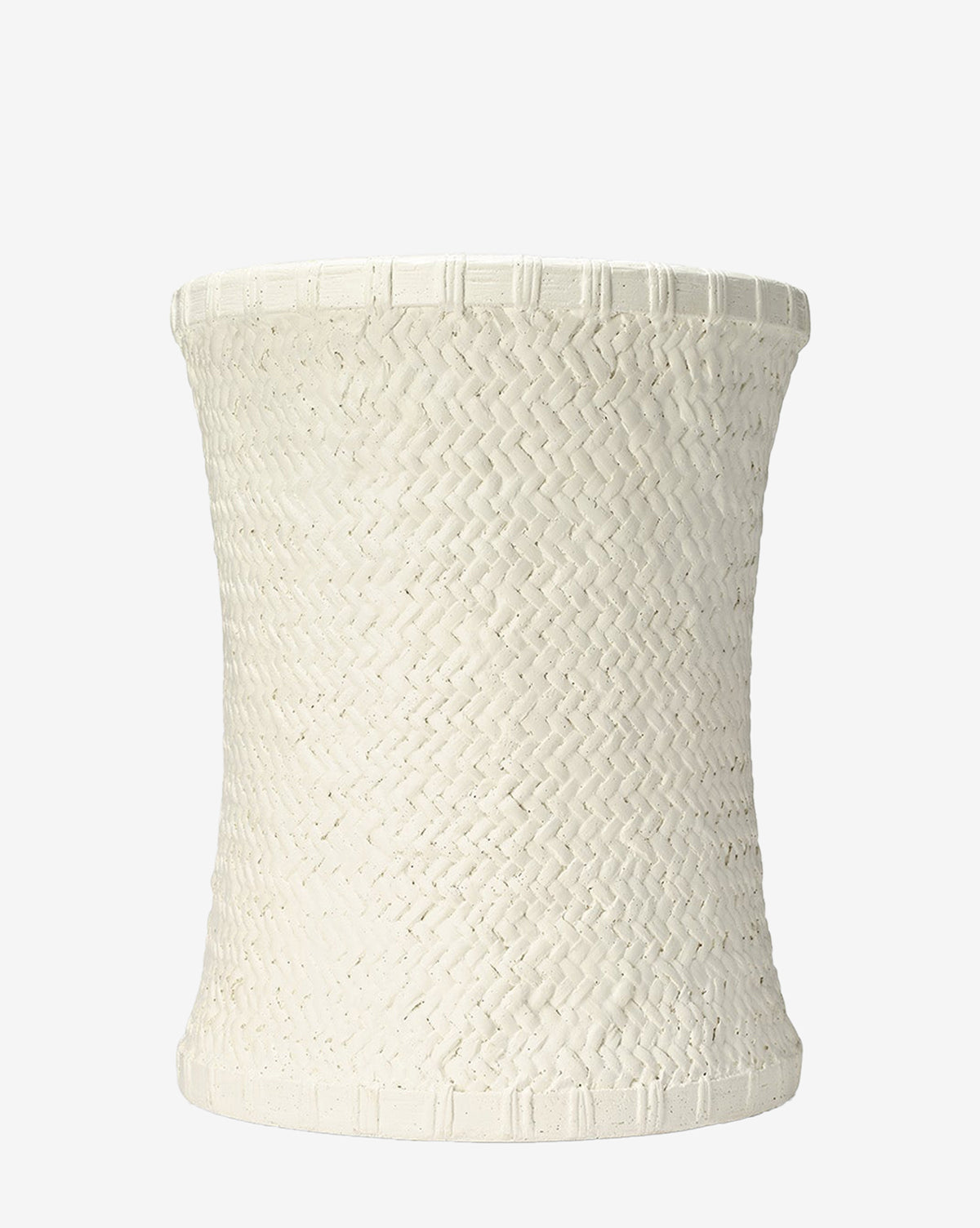 The Keira Stool by Made Goods features a white, cylindrical form with a slightly flared rim and base, showcasing a basket weave-inspired textured surface for a minimalist, handcrafted look by Vendixs