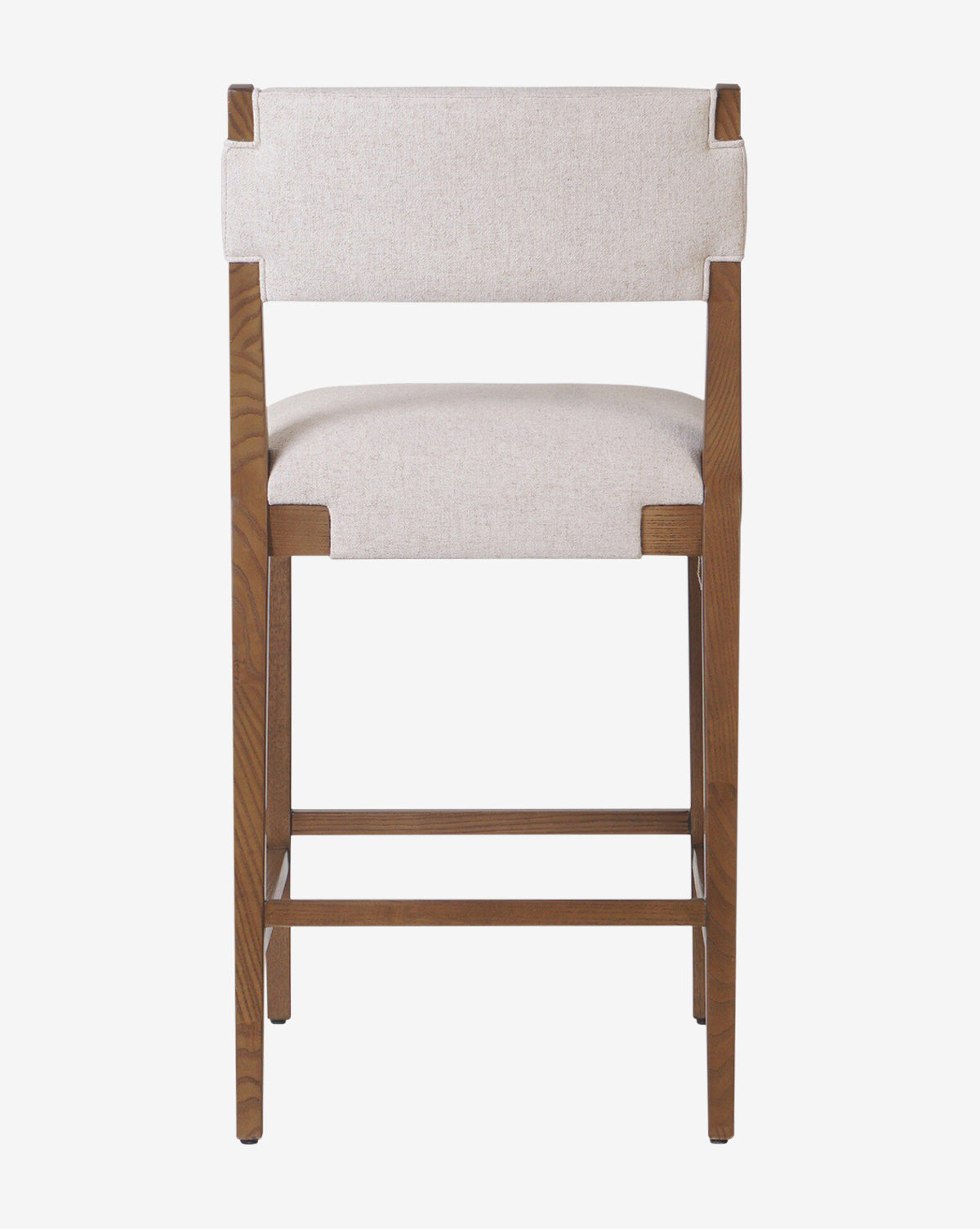 The Kennebec Stool by Four Hands features a modern ash frame with wooden legs in a natural finish and a light beige performance fabric seat and backrest, shown from the back against a white background, Vendixs