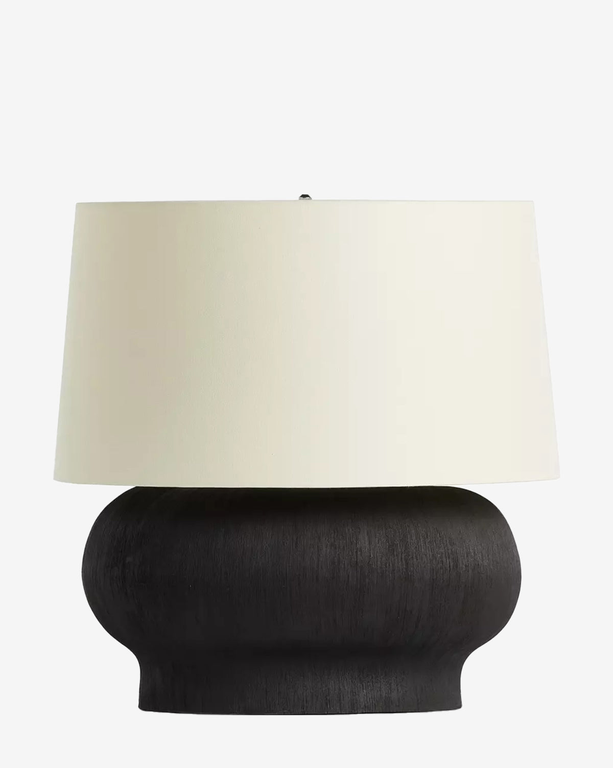 The Kragen Table Lamp by Four Hands features a wide, rounded black ceramic base and an ivory linen shade, creating a modern decorative accent that stands out against any plain white background by Vendixs