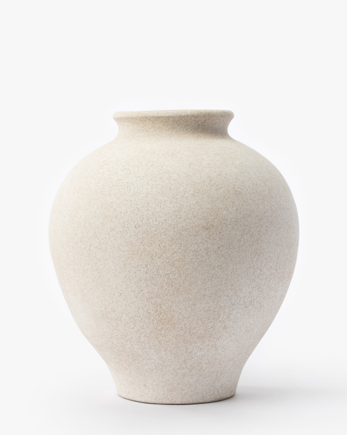 The Krissan Vase is large and round with a smooth, pebbled matte white finish, a slightly narrow neck, and a wide body, shown against a plain white background, by Vendixs