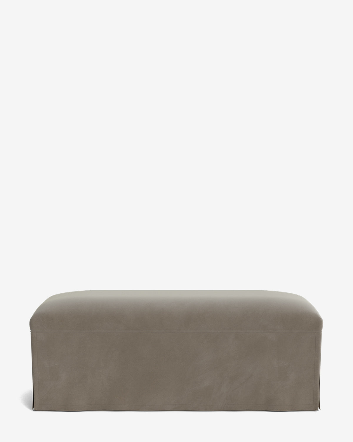 The Latimer Bench is rectangular, features smooth taupe fabric upholstery and a tailored skirt, shown against a plain white background by Vendixs