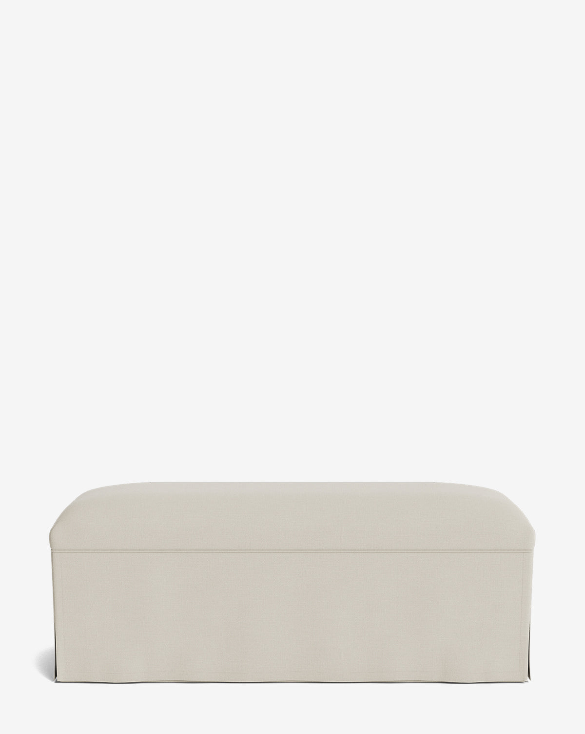 The Latimer Bench is a simple rectangular seat upholstered in beige fabric, with a smooth surface and a tailored skirt at the base, by McGee & Co. Its displayed against a plain white background.