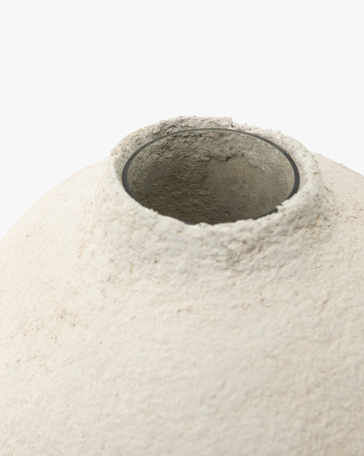 Close-up of the top opening of the LeBeau Paper Mache Vase, featuring a circular mouth and rough-textured beige finish, set against a plain white background, by Vendixs
