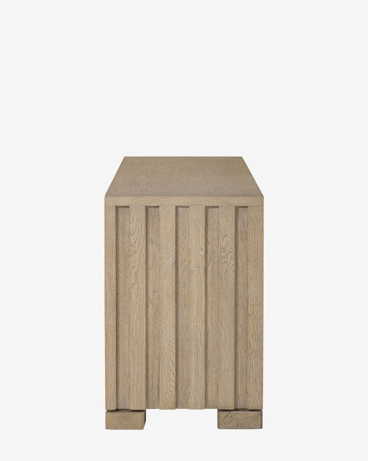 The Leith Console is a square light oak side table featuring vertical front grooves and a minimalist modern design, shown against a plain white background by McGee & Co.