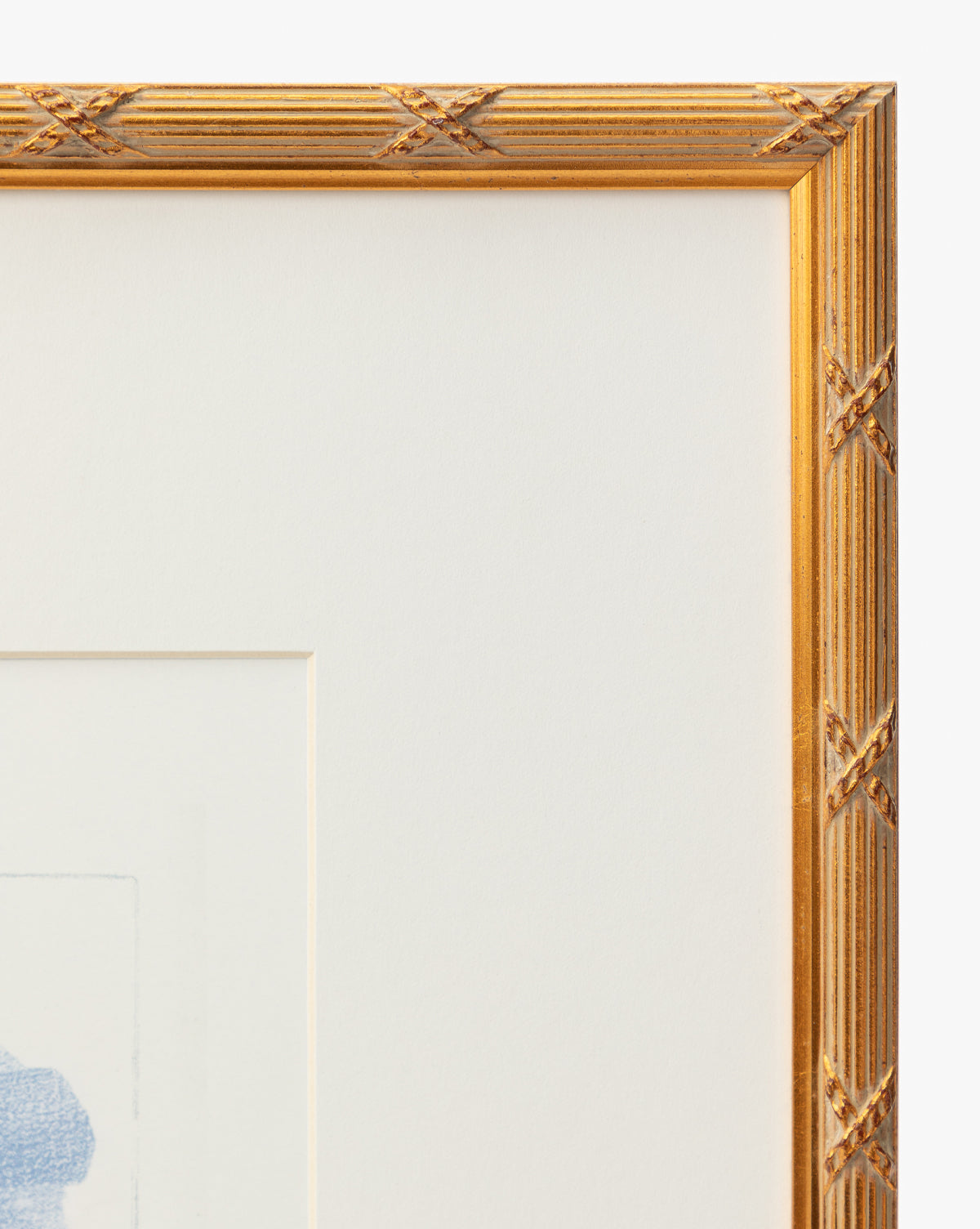 Close-up of the top right corner of a gold frame with a textured, crisscross pattern and white mat, partially revealing the Loose Ribbons light blue giclee print—a cheerful accent ideal for childrens rooms, by Vendixs