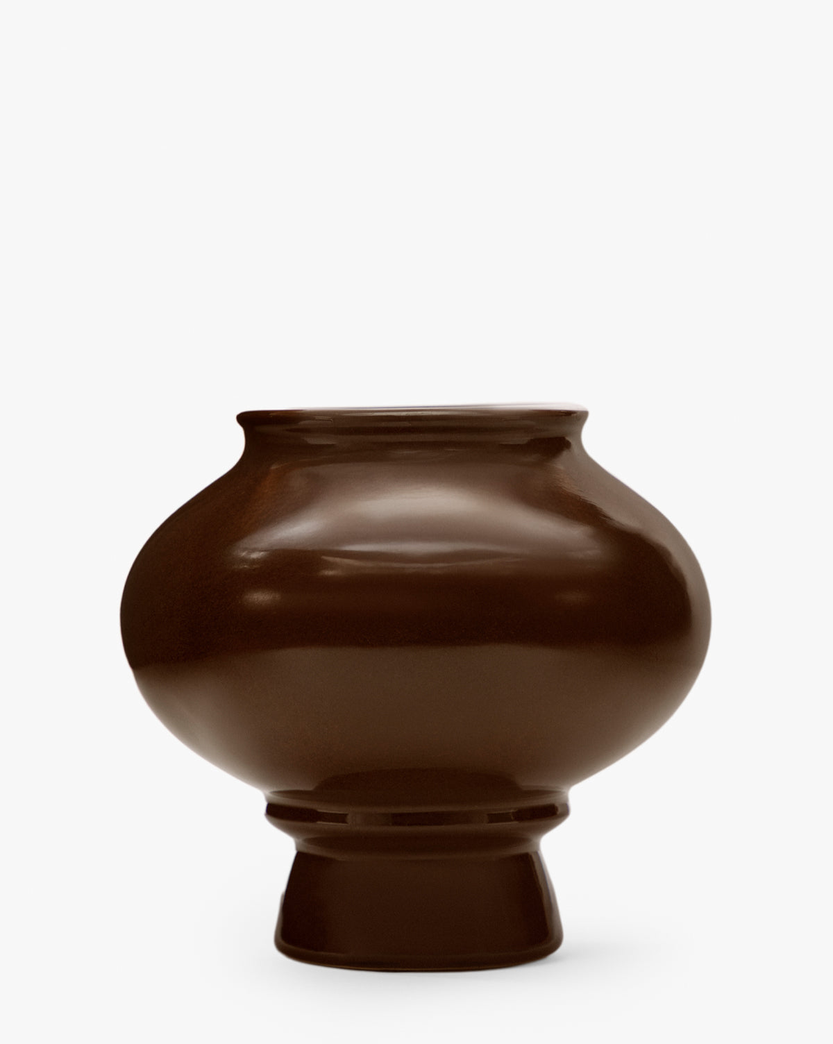 The Louis Vase features a glossy dark brown finish, a wide, rounded body, and a narrow flared base that creates a sculptural silhouette against a plain white background, by Vendixs