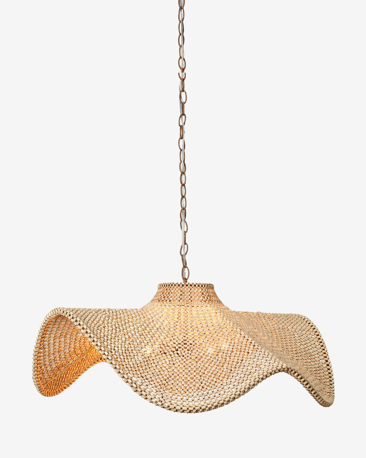 The Lourdes Chandelier by Made Goods features a woven rattan, wavy sculptural shade with natural wood beads, hanging from a metal chain. This pendant emits a warm, soft glow through its natural materials. Vendixs
