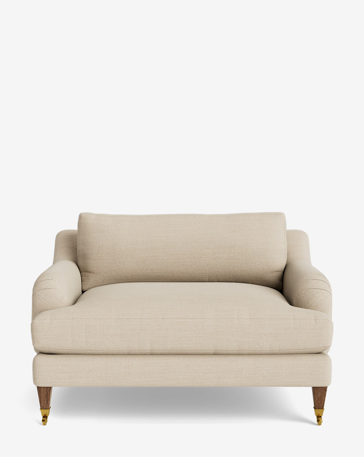 The Lucille English Roll Arm Chair and a Half features a wide, light beige design with plush down-wrapped cushions, rounded armrests, wooden legs (front legs with brass casters), and is customizable, by McGee & Co. Shown against a plain white background.