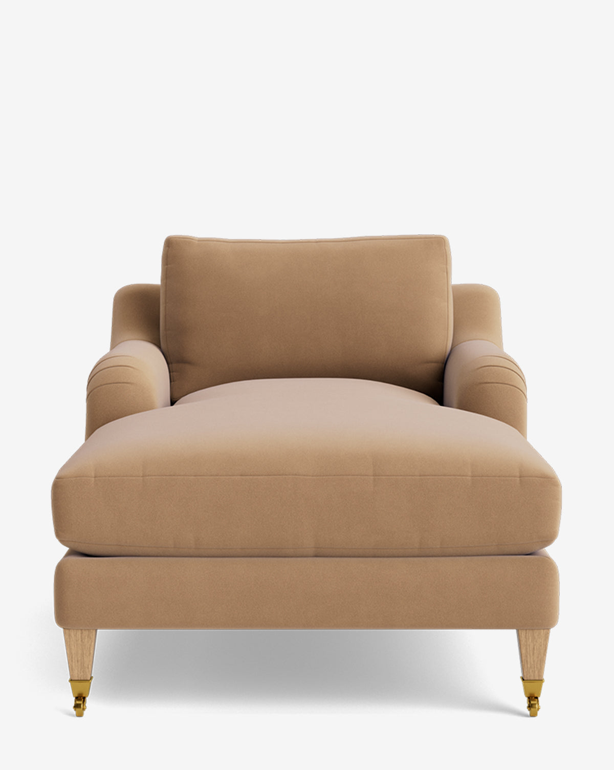 The Lucille English Roll Arm Lounge Chair features tan upholstery, plush down-wrapped cushion, gently rolled arms, and four wooden legs with brass-accented front casters. Also available as a customizable chair by McGee & Co.