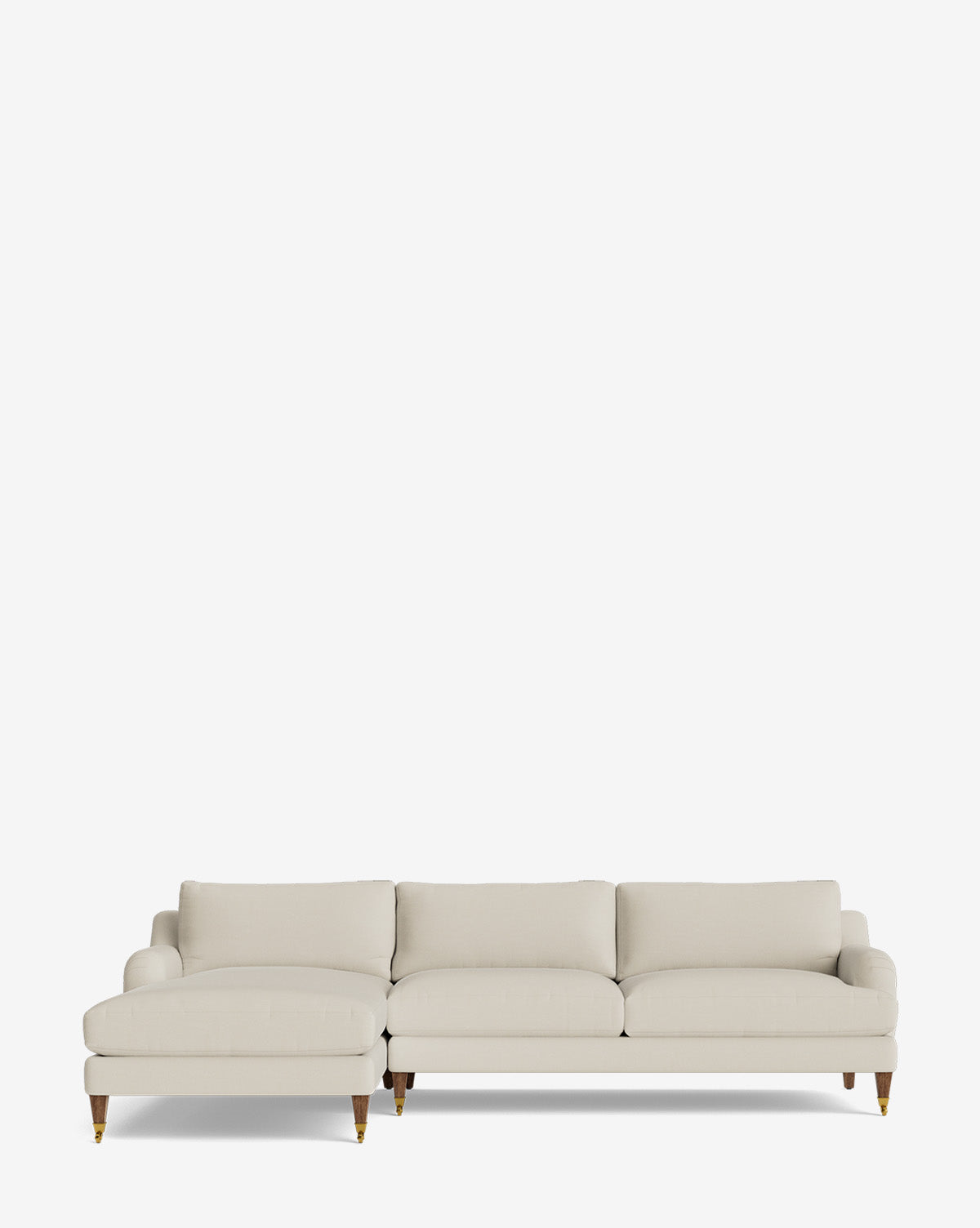 The Lucille English Roll Arm Left Chaise Sectional 107 is a modern, light beige sofa with three seat and back cushions and wooden legs with brass caps, shown against a plain white background, by Vendixs
