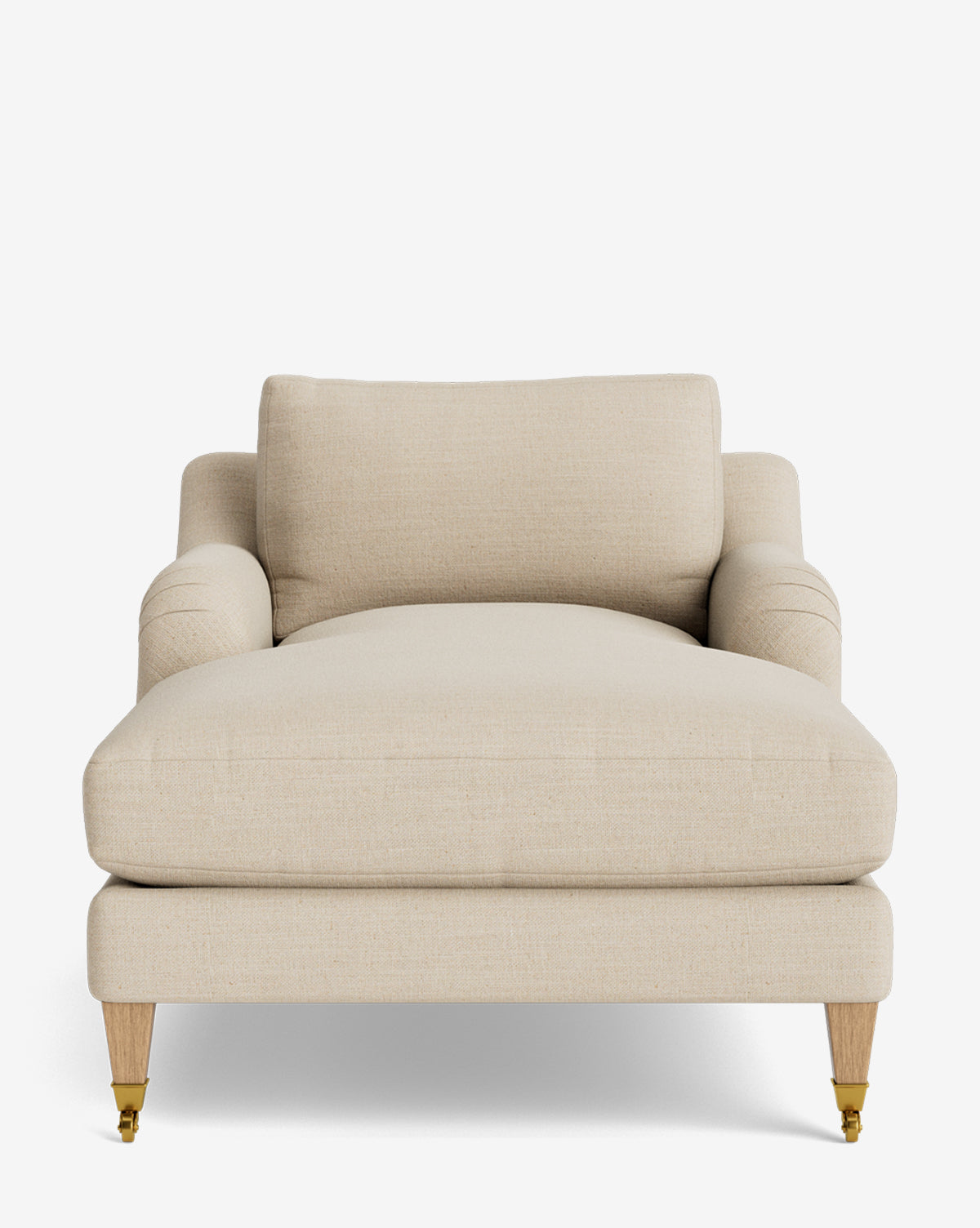 The Lucille English Roll Arm Lounge Chair features a wide, beige upholstered design with a plush down-wrapped cushion, wooden legs, and brass front casters for classic elegance, shown against a plain white background by McGee & Co.