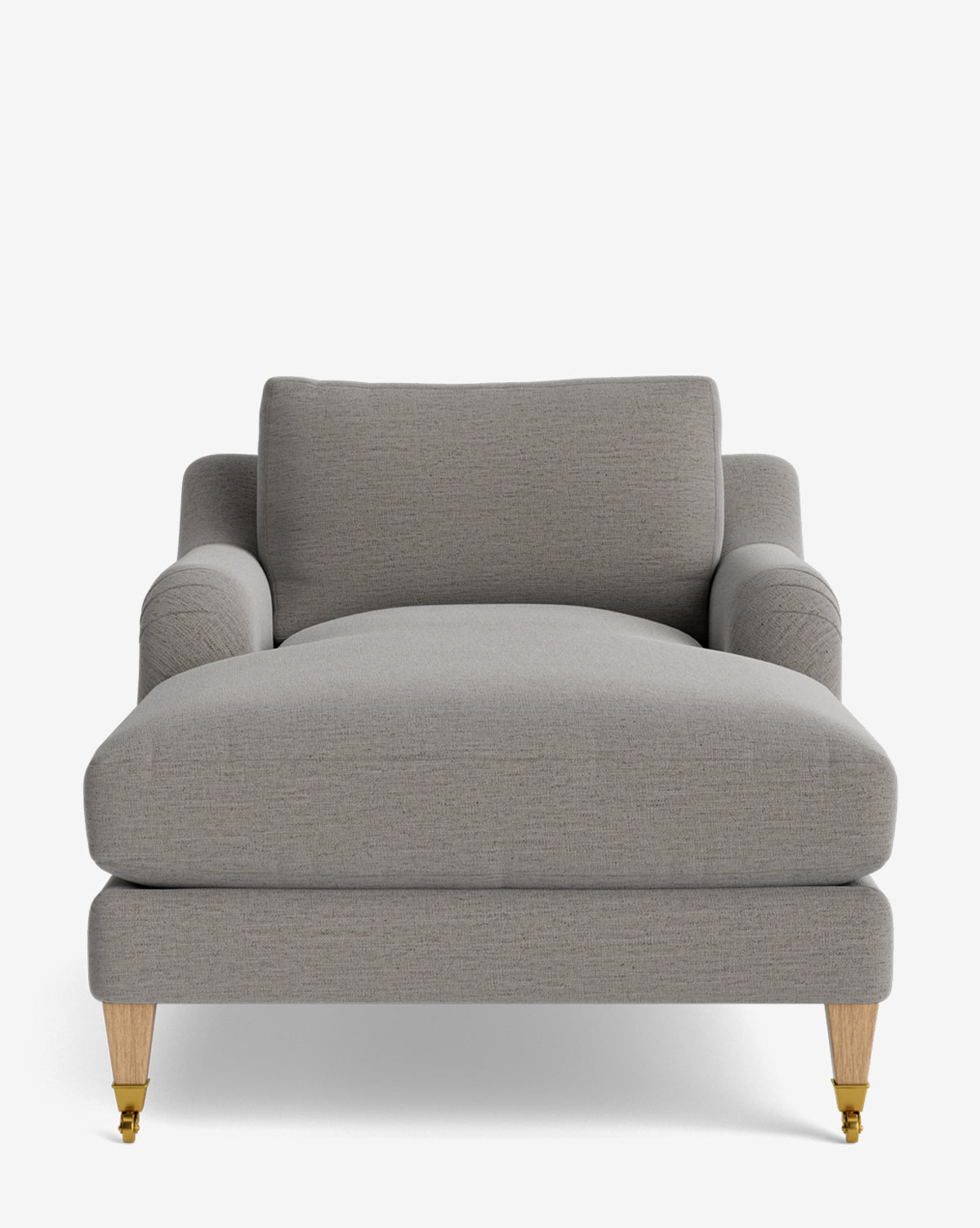 A front view of the Lucille English Roll Arm Lounge Chair, a modern, wide, light gray upholstered chaise with wooden legs, two brass casters on the front legs, and a down-wrapped cushion for comfort, set against a white background by McGee & Co.