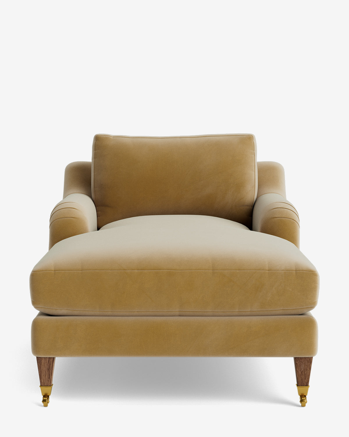 Front view of the Lucille English Roll Arm Chaise Lounge, shown with tan velvet upholstery, wooden legs with brass castors, a plush down-wrapped cushion, single back cushion, and gently curved armrests. Customizable design by McGee & Co.