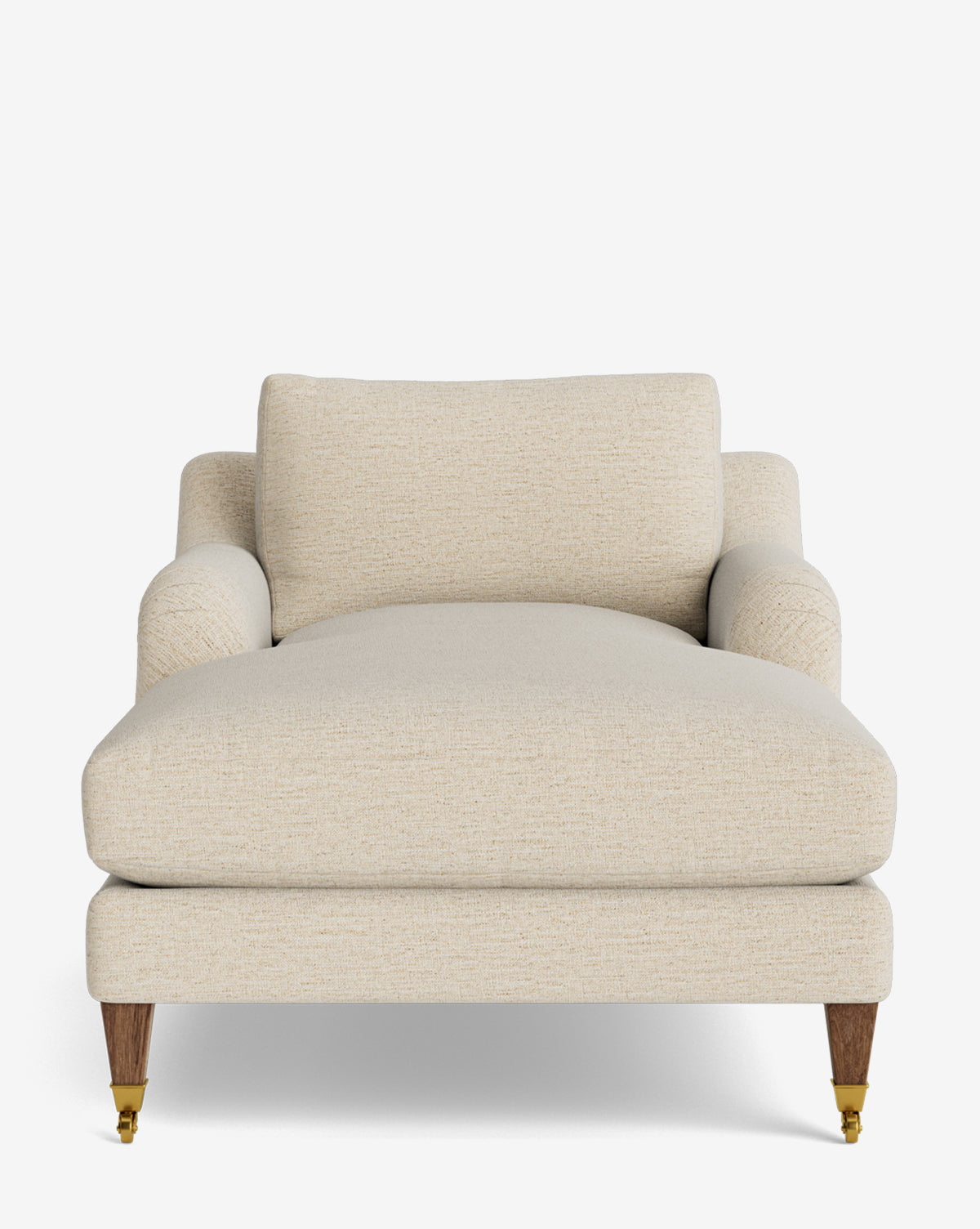 The Lucille English Roll Arm Lounge Chair features a modern cream upholstery, wide seat, low arms, plush down-wrapped cushion, and wooden legs, with brass casters on the front legs by McGee & Co.