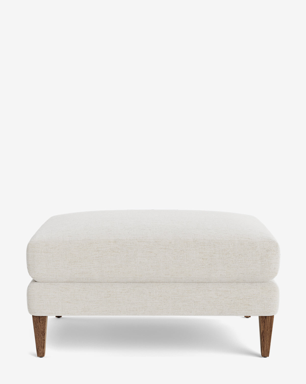 The Lucille Ottoman is a modern rectangular ottoman with light beige upholstery, wooden legs, and clean lines—ideal for any customizable ottoman setup, by McGee & Co.