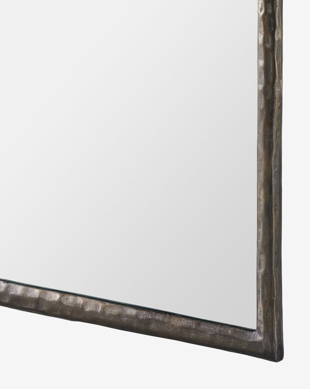 A close-up of the Lumi Wall Mirrors corner, showcasing its textured metallic frame against a white background, by McGee & Co.