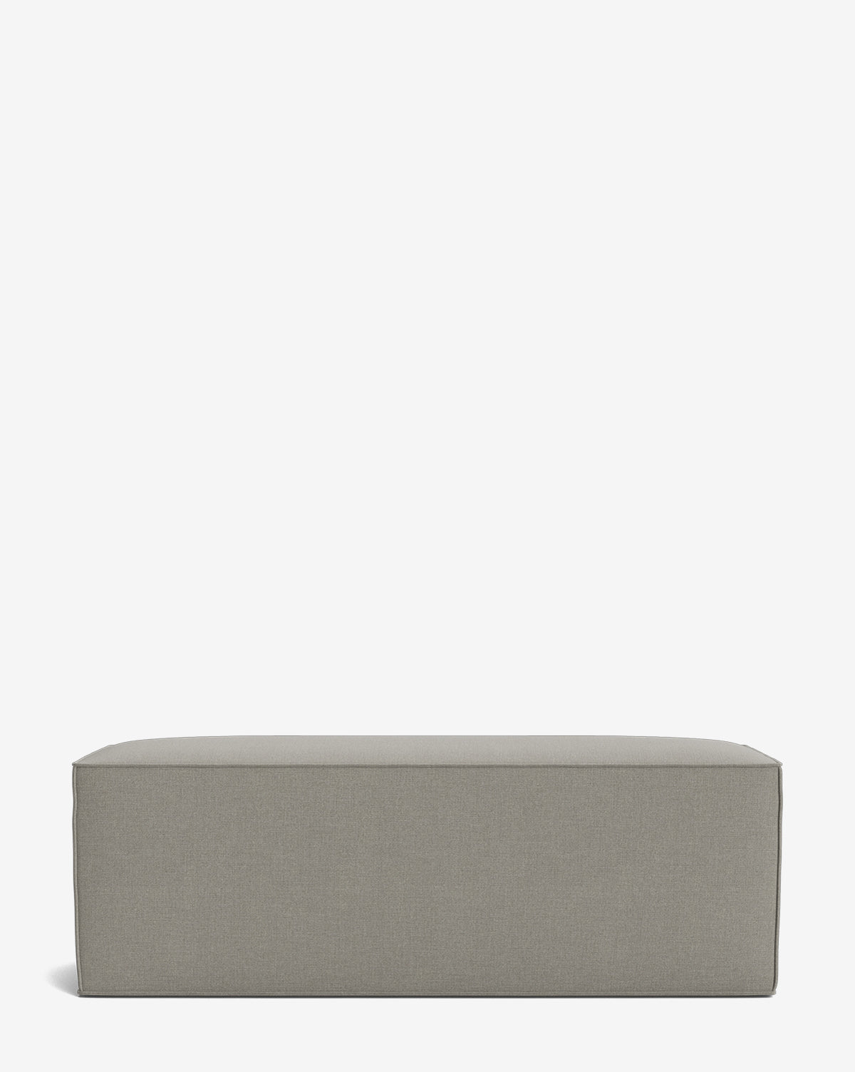 A rectangular Johannes Bench by Rowe Fine Furniture, Inc. in light gray with clean lines and a cushioned, smooth fabric seat is set against a plain white background. Vendixs