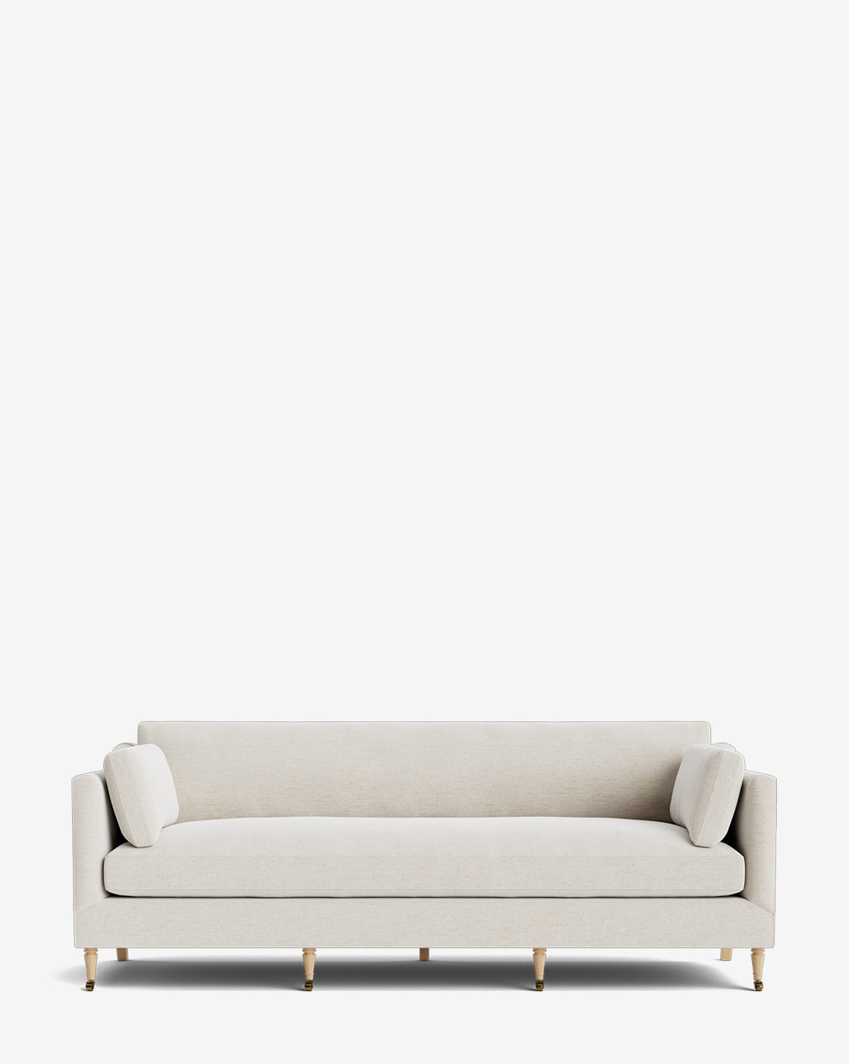 The Haverford Upholstered Sofa 90 is a modern, light beige sofa featuring straight arms, two cylindrical bolster pillows, and slender gold-capped legs, shown against a plain white background by Vendixs