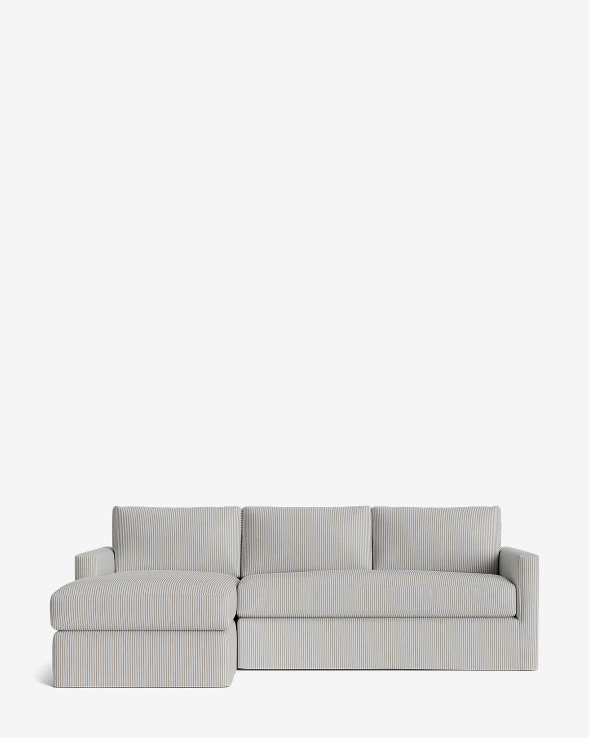 The Macy Slipcover Chaise Sectional 101 is a modern light gray sofa with a left-facing chaise, three back cushions, slim armrests, and subtle vertical stripe upholstery. Shown on a plain white background by Vendixs