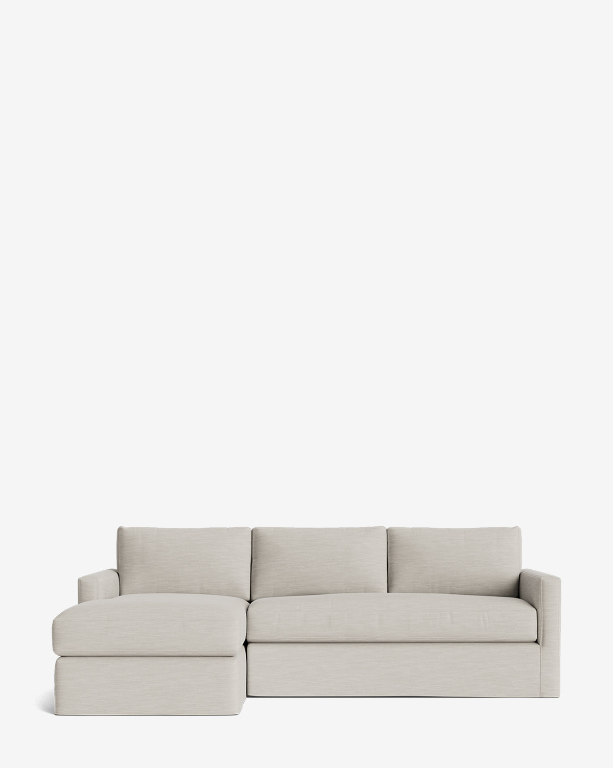 The Community Macy Slipcover Chaise Sectional 101 in light gray features three back cushions, a left-side chaise lounge, square arms, and clean lines, shown against a plain white background. Vendixs