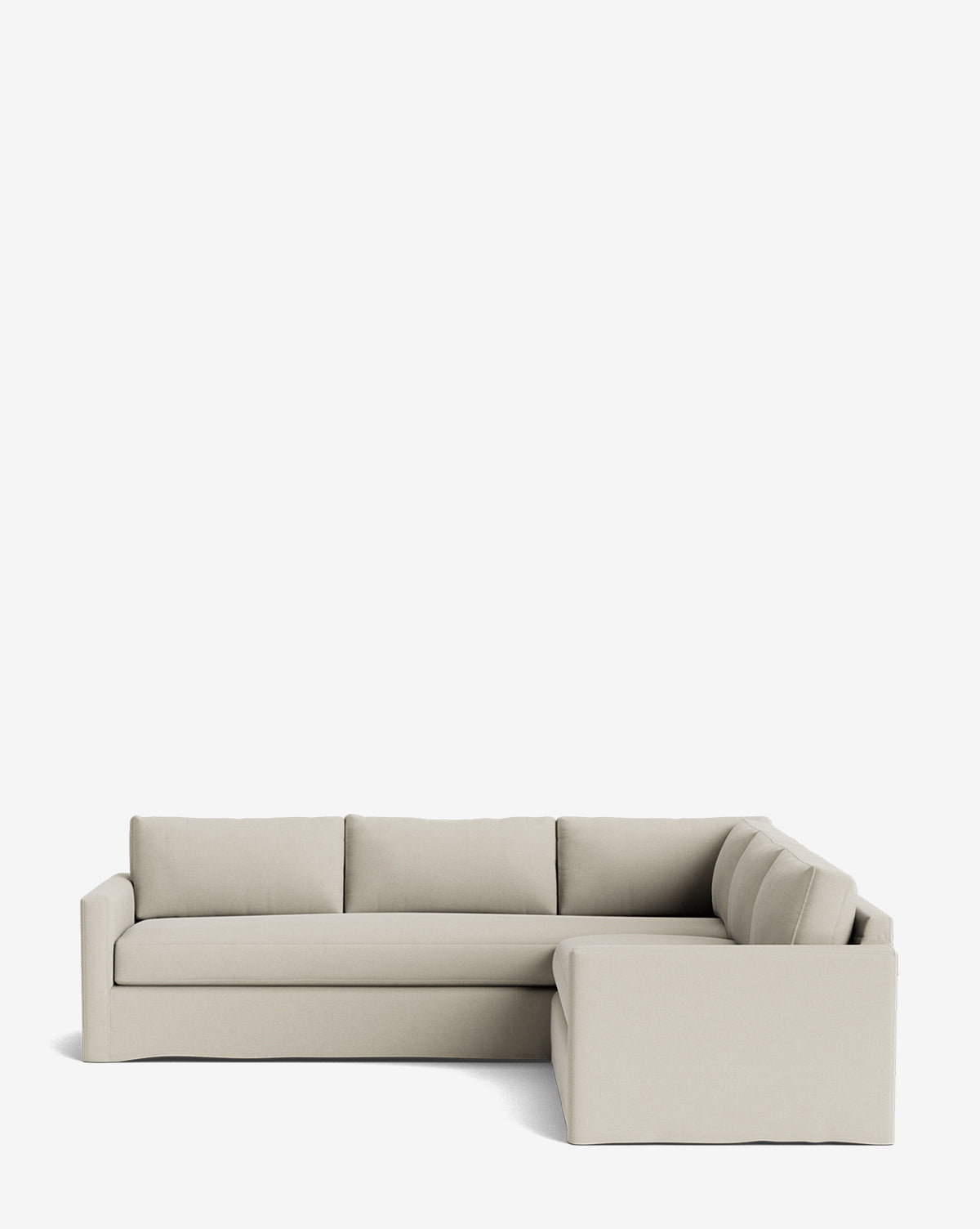 The Macy Slipcover L Sectional 108 in light beige, with clean lines and three back cushions, features a deep silhouette and is displayed against a plain white background by McGee & Co.