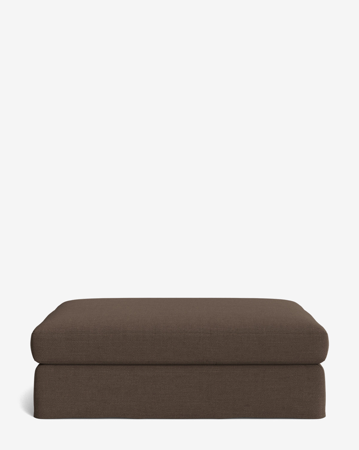 The Macy Slipcover Ottoman is a rectangular, customizable brown upholstered piece with a simple modern design, making it versatile living room furniture, shown against a plain white background by Vendixs