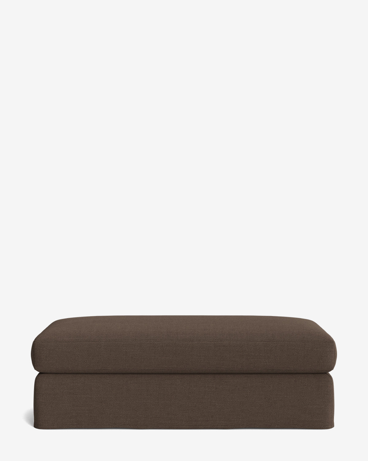 The Macy Slipcover Ottoman is a rectangular, brown ottoman with clean lines, ideal for living room decor, shown against a plain white background, by Vendixs