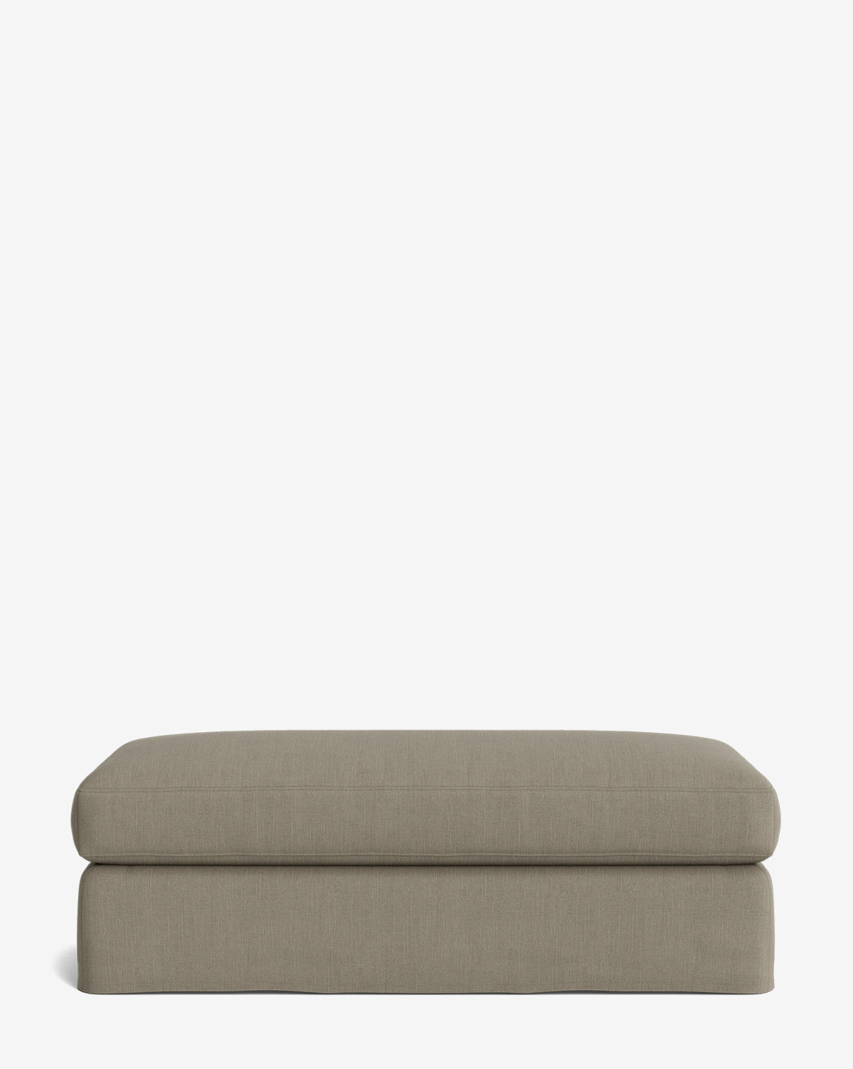 The Macy Slipcover Ottoman is a rectangular, light brown ottoman featuring a flat cushioned top and minimalist design—ideal as customizable living room furniture, shown against a plain white background, by McGee & Co.
