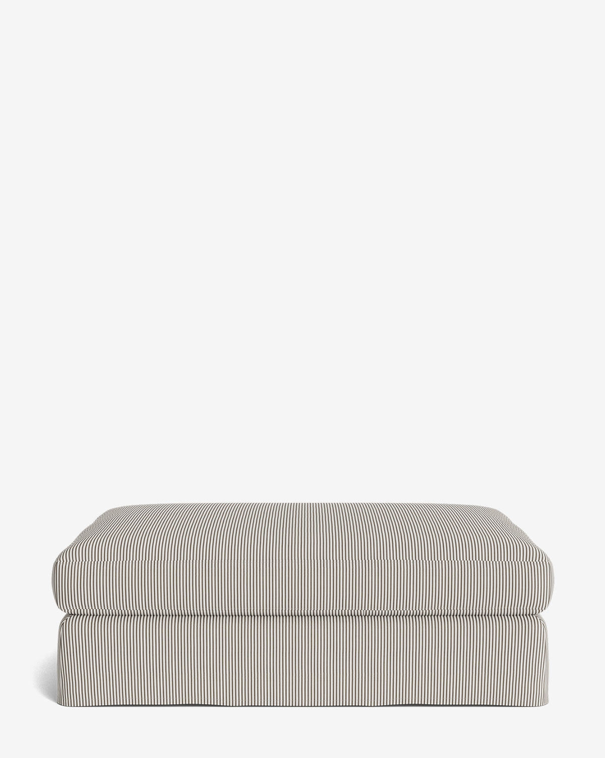 The Macy Slipcover Ottoman features a thick cushion and fabric with thin vertical black and white stripes, making it a customizable rectangular addition to your living room décor, by Vendixs Shown against a plain white background.