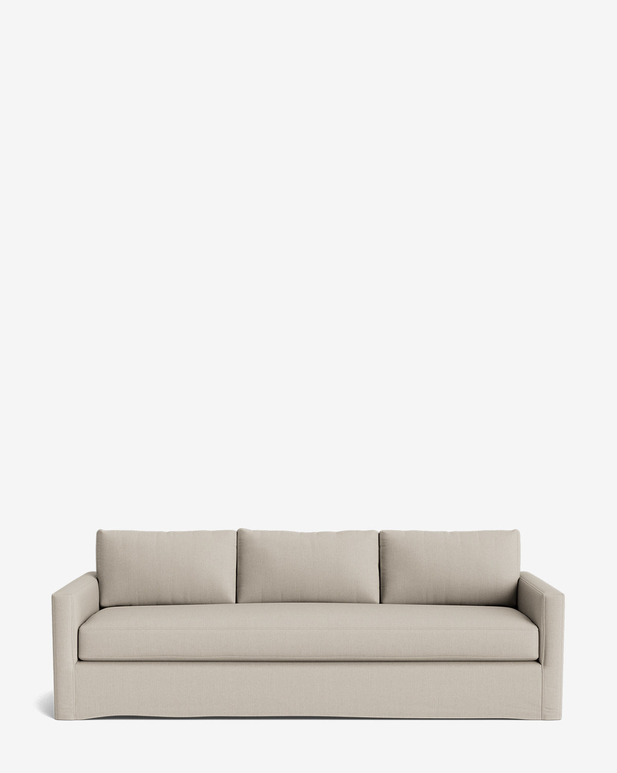 The Macy Slipcover Sofa (84-96) is a modern, light beige upholstered sofa with deep seating, three seat cushions, three matching back pillows, wide curved arms, and a minimalist design. Shown against a plain white background by Vendixs