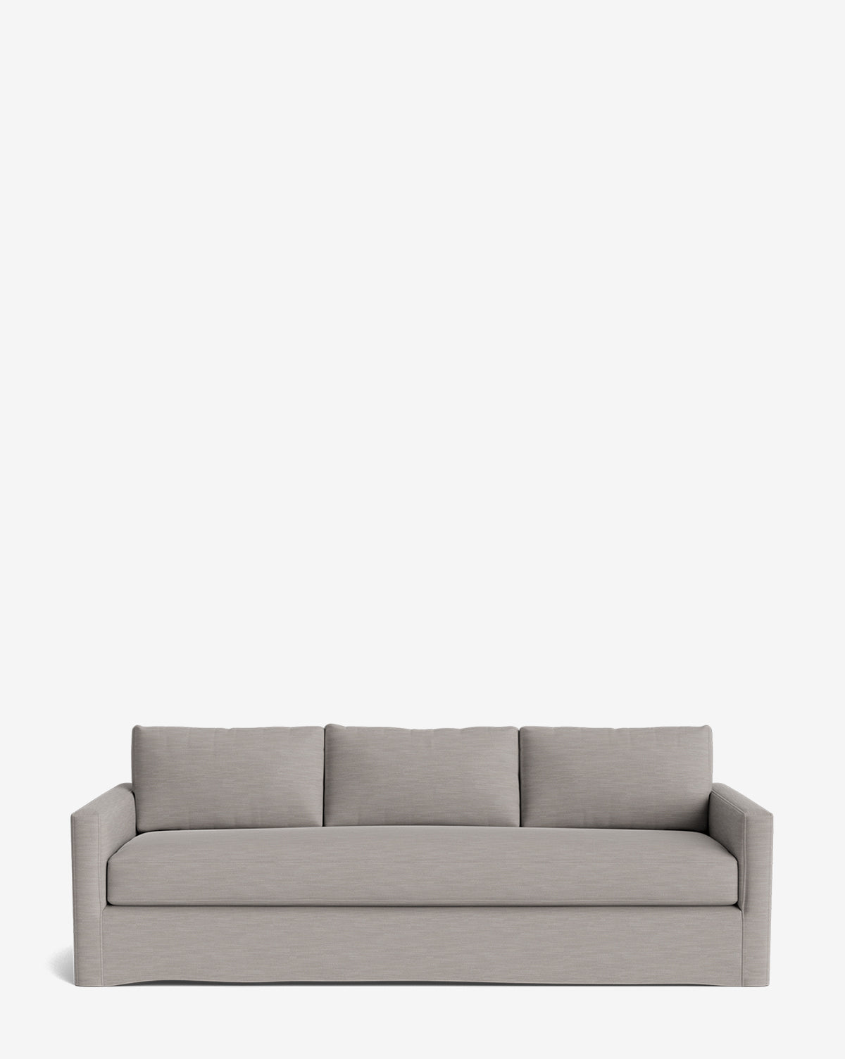The Macy Slipcover Sofa (84-96) is a modern, light gray deep sofa with straight arms and three back cushions, shown against a plain white background, by McGee & Co.