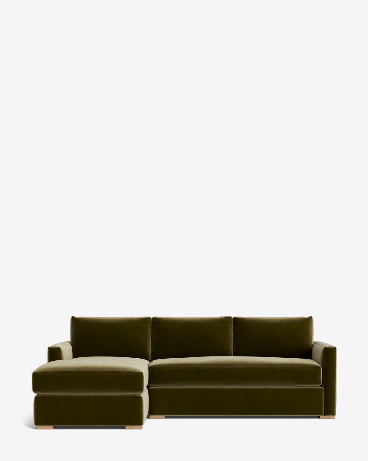 The Community Macy Upholstered Chaise Sectional 101 is a modern, dark green velvet luxury sofa with three back cushions and a left-facing chaise, shown against a plain white background. Vendixs