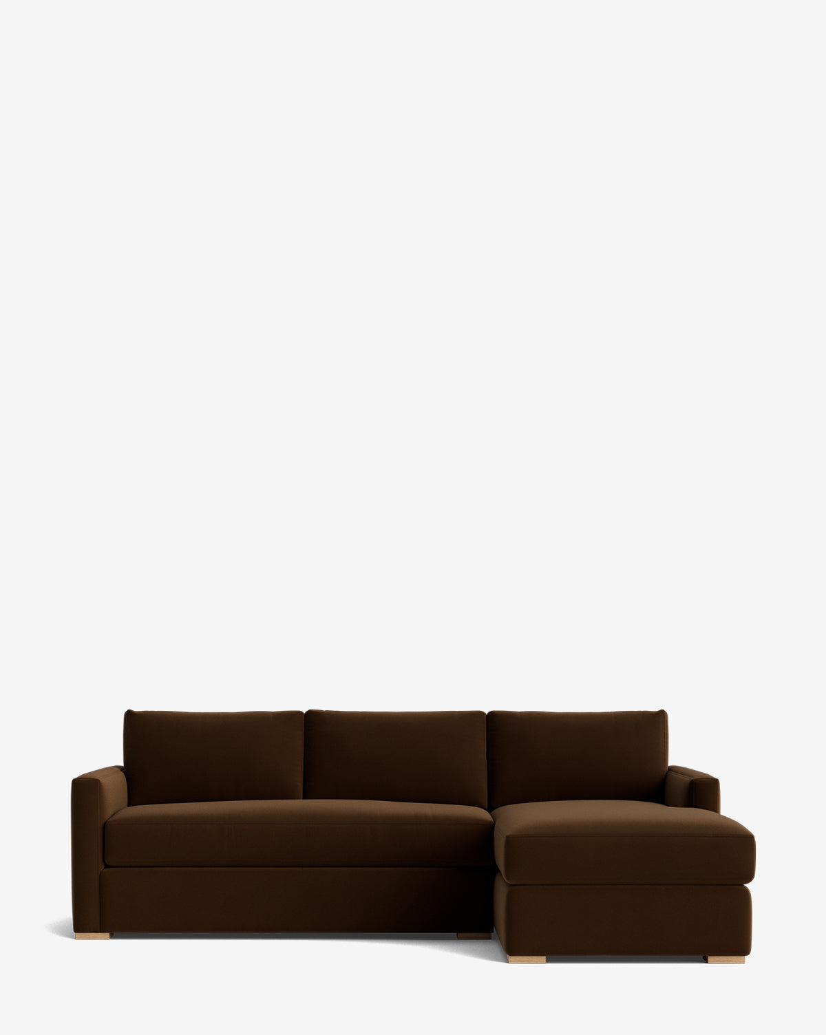 The Macy Upholstered Chaise Sectional 101 is a dark brown, L-shaped sofa with a right-facing chaise, clean lines, plush cushions, and low wooden feet—ideal for adding stylish comfort to your living room, by Vendixs