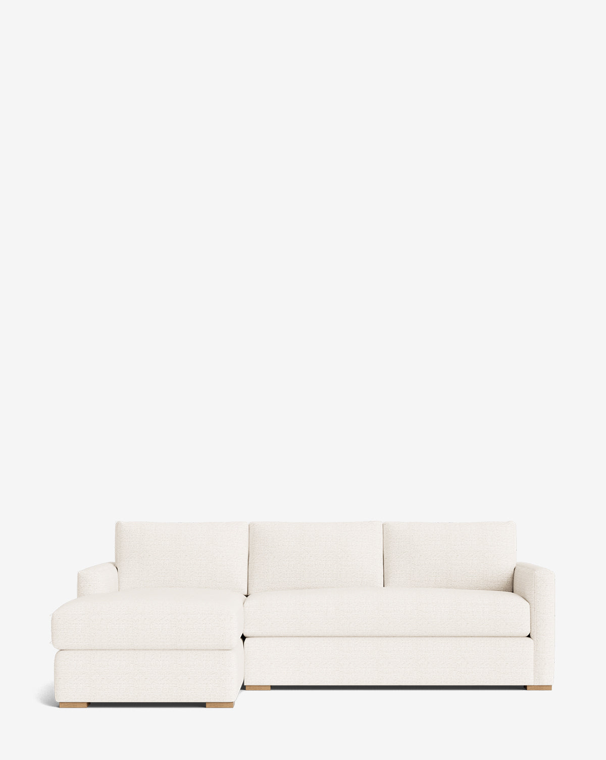The Community Macy Upholstered Chaise Sectional 101 features a left-side lounge and off-white fabric, blending luxury and comfort for modern spaces. Shown on a clean white background. Vendixs